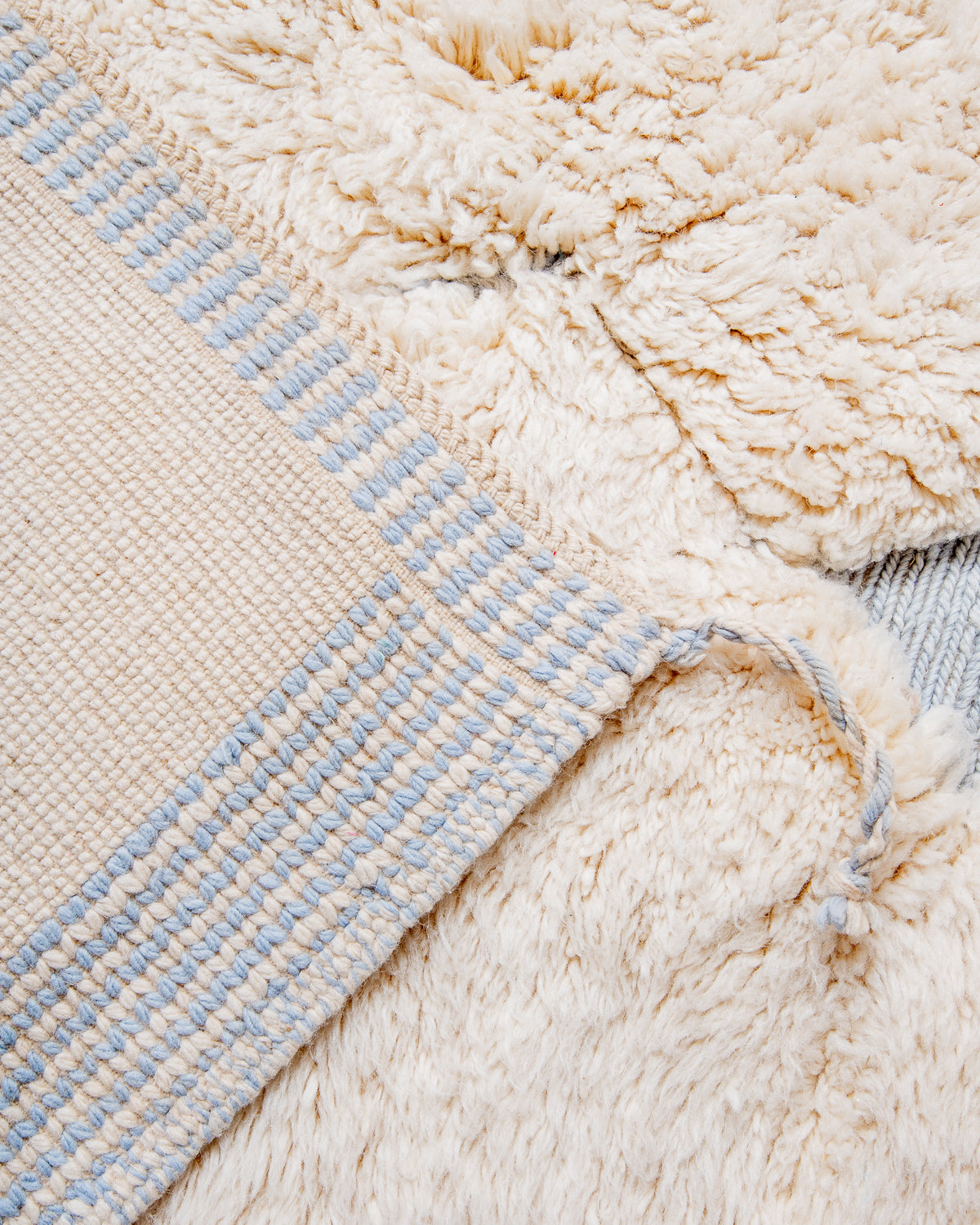 Modern, designer, handcrafted 100% sheep’s wool Berber rug from Morocco. Beni M’rirt carpet with beautiful colours and patterns and fluffy wool texture.